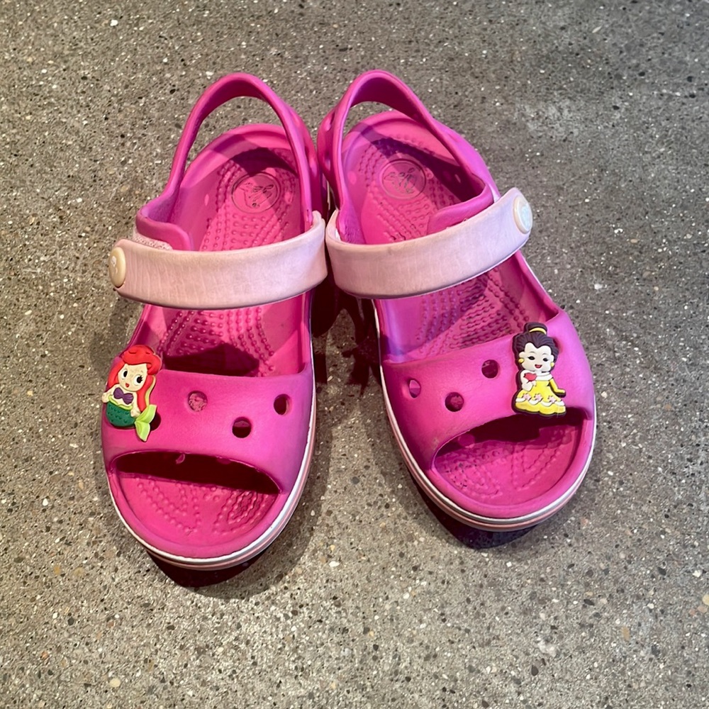 Bright pink crocs